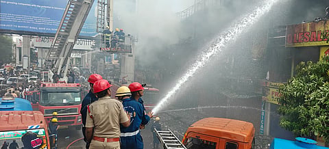 Fireffighers trying to douse the fire which broke out at commercial helmet market in Hyderabad's Ameerpet area on Thursday, June 4, 2026.