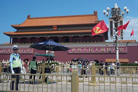 Flags bearing the hammer and sickle symbol are flown in front of Tiananmen Gate in Beijing, China, Thursday, June 4, 2026. 