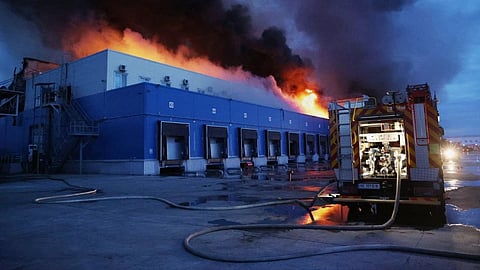 In this photo provided by the Ukrainian Emergency Services on Thursday, June 4, 2026, a storage depot is seen on fire after a Russian strike on Dnipropetrovsk region, Ukraine.