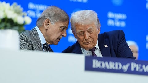 US President Donald Trump, right, speaks with  Shehbaz Sharif, Prime Minister of Pakistan, during a signing of the Board of Peace charter during the Annual Meeting of the World Economic Forum in Davos, Switzerland, Thursday, Jan. 22, 2026.