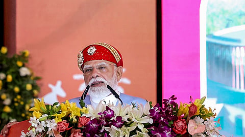 Prime Minister Narendra Modi addresses during the inauguration and laying of foundation stones of various development projects, in Daman. 