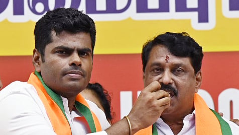 Former BJP leader K Annamalai with Tamil Nadu BJP President Nainar Nagenthran.