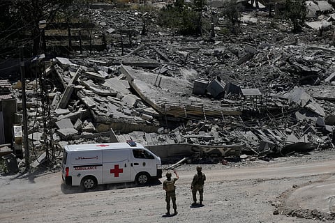 Lebanese soldiers deploy at a road in front of destroyed houses in Dibbine village, southeast Lebanon, Friday, June 5, 2026, a day after Israeli forces withdrew following clashes with Hezbollah fighters. 
