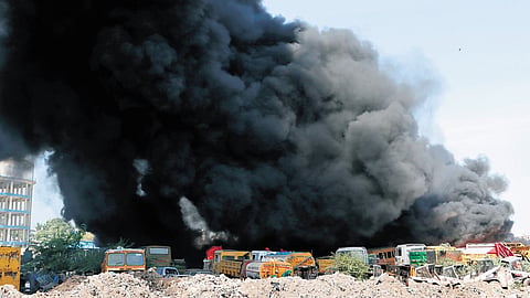 Thick black smoke engulfed parts of the city’s southern suburb after fire erupted at GCC’s dumpyard in Pallikaranai on Thursday morning.