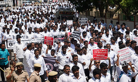 District court advocates staged a demonstration in Madurai on Friday.