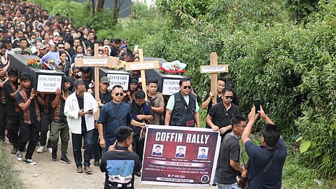 Kuki community takes out a coffin rally for three of its members who were killed in an attack in the state’s Kangpokpi district on Friday morning. 