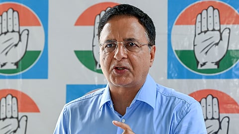 AICC General Secretary and Karnataka in-charge Randeep Singh Surjewala addresses a press conference in New Delhi.