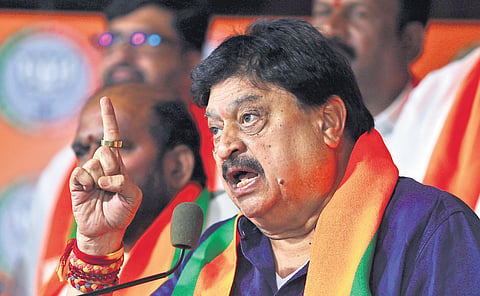 State BJP chief N Ramchander Rao gestures as he speaks during a press conference at the party office in Nampally, Hyderabad on Sunday