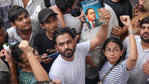 Cockroach Janta Party (CJP) founder Abhijeet Dipke during a protest demanding the resignation of Union Education Minister Dharmendra Pradhan over alleged examination-related lapses, at the Jantar Mantar, in New Delhi, Saturday, June 6, 2026.