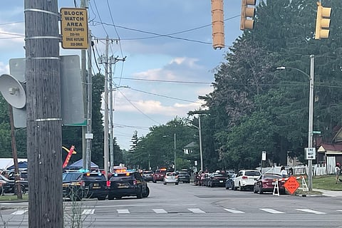 Police officers work at the scene of a shooting near a festival in Toledo, Ohio on Saturday, June 6, 2026. 