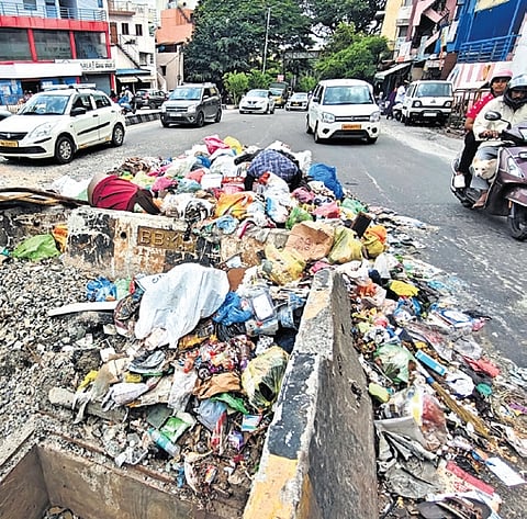 Garbage dumped at Kadirenahalli Cross 