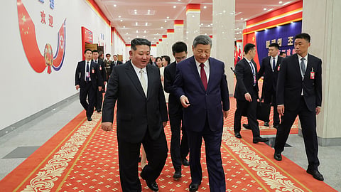 In this photo provided by the North Korean government, North Korean leader Kim Jong Un, left, and Chinese President Xi Jinping, right, walk together after a welcome performance in Pyongyang, Monday, June 8, 2026.