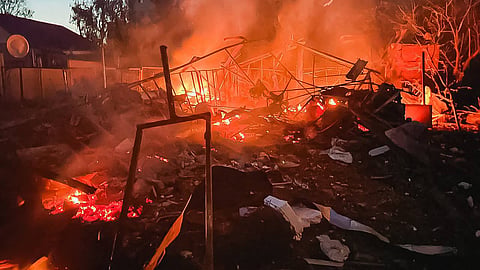 This handout taken and released by the State Emergency Service of Ukraine on June 9, 2026 shows smoke rising from a fire following Russian strikes in the Kharkiv region, amid the Russian invasion of Ukraine.