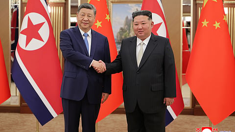 In this photo provided by the North Korean government, North Korean leader Kim Jong Un, right, and Chinese President Xi Jinping, left, shake hands ahead of their talk at Kumsusan State Guesthouse in Pyongyang, Monday, June 8, 2026.