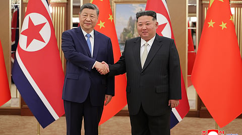 In this photo provided by the North Korean government, North Korean leader Kim Jong Un, right, and Chinese President Xi Jinping, left, shake hands ahead of their talk at Kumsusan State Guesthouse in Pyongyang, Monday, June 8, 2026. Independent journalists were not given access to cover the event depicted in this image distributed by the North Korean government. The content of this image is as provided and cannot be independently verified. Korean language watermark on image as provided by source reads: "KCNA" which is the abbreviation for Korean Central News Agency.
