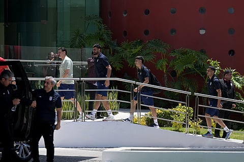 Members of Iran's football team arrive at their hotel after  after a training session in Tijuana, Mexico on Monday