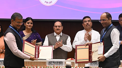 Health Minister JP Nadda and Chief Minister of West Bengal, Suvendu Adhikari during the MoU signing of Ayushman Bharat PM-JAY scheme, at Vigyan Bhawan, in New Delhi on Monday.