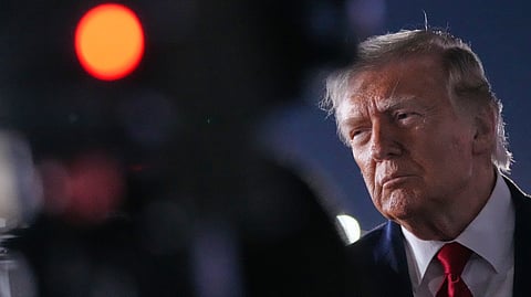 President Donald Trump talks with reporters before boarding Air Force One at John F. Kennedy International Airport in New York, early Tuesday, June 9, 2026.