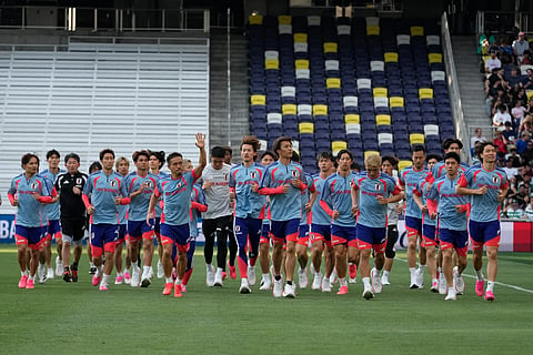 The Japan national team jogs around the pitch during a training session Monday, June 8, 2026, in Nashville, Tenn., ahead of the World Cup soccer tournament. 