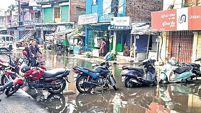 Agitators blocking the waterlogged road with motorcycles in Digapahandi 