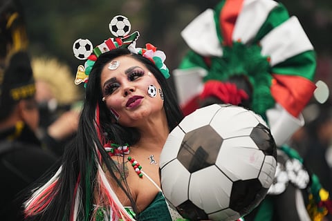 A dancer performs along Reforma Avenue in Mexico City, Saturday, June 6, 2026 ahead of the FIFA World Cup.