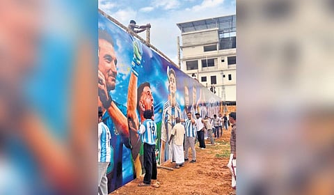 Argentina fans setting up a 666-foot-long hoarding in Munda near Nilambur