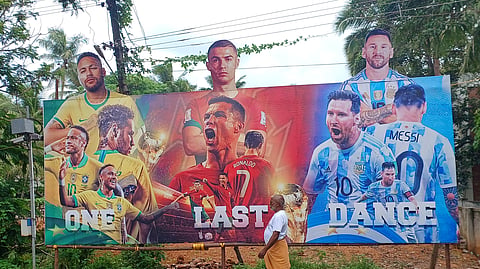 Lords of the field: Football favourites are all over the billboards in the city, as FIFA World Cup kicks off. 