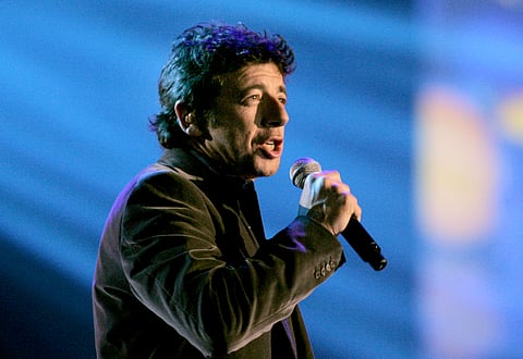 French singer Patrick Bruel performs during the Victoires de la Musique awards ceremony in Paris on March 10, 2007.