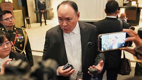 Philippine's Defense Secretary Gilberto Teodoro talks to the media as he attends the Shangri-La Dialogue, Asia's annual defense and security forum, in Singapore on May 29, 2026.