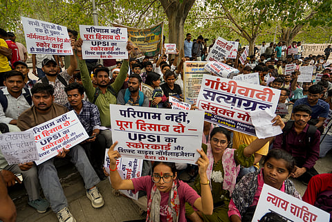 Supporters of the Cockroach Janata Party (CJP) take part in a protest demanding the resignation of Union Education Minister Dharmendra Pradhan over alleged examination-related lapses at Eco Garden, in Lucknow, Uttar Pradesh, on Friday, June 12, 2026.