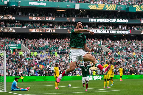 Mexico's Raul Jimenez celebrates after scoring his side's second goal during the World Cup Group A soccer match between Mexico and South Africa in Mexico City, Thursday, June 11, 2026.