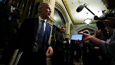 Prime Minister Mark Carney arrives to a caucus meeting in Ottawa on Wednesday, June 10, 2026.