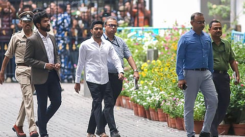 In this photo from June 11, TMC MP Abhishek Banerjee arrives at CID Headquarter, Bhawani Bhawan, in Kolkata.