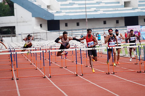 Tejas Shirse (C) in action on Saturday