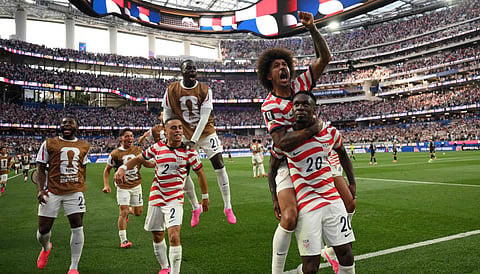 USA's Folarin Balogun (20) celebrates after scoring against Paraguay on Friday