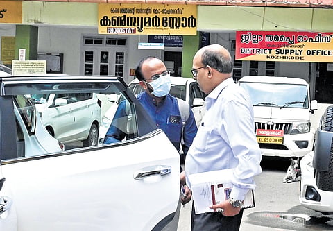 Kozhikode Medical College principal K G Sajeeth Kumar interacting with one of the experts from the ICMR after the review meeting at the collectorate 