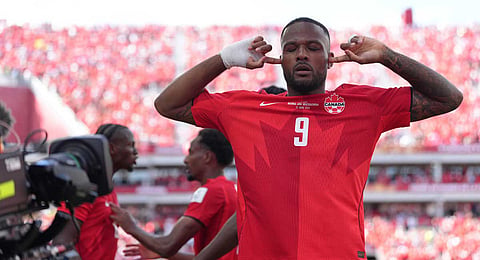 Canada's Cyle Larin (9) celebrates after scoring his sides first goal of the game in the second half of the World Cup Group B soccer match between Canada and Bosnia, Friday, June 12, 2026, in Toronto. 