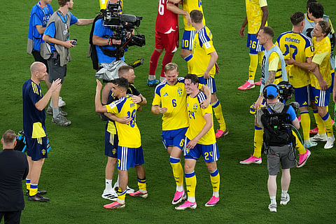 Sweden players celebrate after the World Cup Group F soccer match between Sweden and Tunisia in Guadalupe, near Monterrey, Mexico, Sunday, June 14, 2026. 
