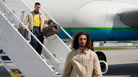 Spain defender Marc Cucurella arrives with teammates for the World Cup soccer tournament Friday, June 5, 2026.