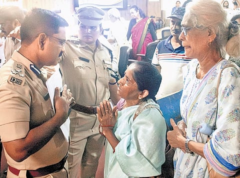 Elderly people share their struggles with Joint Commissioner of Police (East) Ramesh Banoth at a conference in Bengaluru on Monday