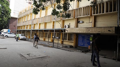 Coimbatore Government Medical College Hospital is yet to shift OP services from the block deemed unsafe three months ago.