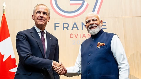 Canadian Prime Minister Mark Carney, left, meets with Prime Minister of India Narendra Modi, during the G7 summit in Evian-les-Bains, France, Tuesday, June 16, 2026.