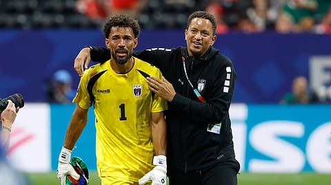 Cabo Verde goalkeeper Vozinha, left, reacts after the World Cup Group H soccer match between Spain and Cape Verde.