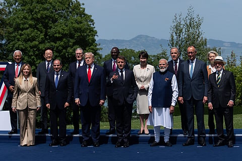 Leaders gather for a group photo at the G7 summit, Tuesday, June 16, 2026, in Evian-les-Bains, France. 