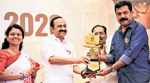 Chief Minister V D Satheesan presents the P Kesavadev Literary Award to writer Subhash Chandran at a function in Thiruvananthapuram on Wednesday. Minister Bindhu Krishna is also seen.
