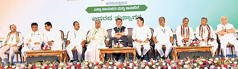 (From left) Dr Yathindra Siddaramaiah shares the dais with his father and former CM Siddaramaiah, CM DK Shivakumar, AICC general secretary (Karnataka in-charge) Randeep Singh Surjewala and KPCC chief BK Hariprasad and others at the CLP meeting held at a resort near Bidadi on Tuesday