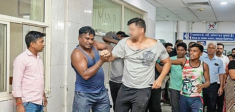 The doctor being assaulted inside Malkangiri DHH on Wednesday.