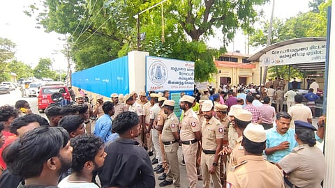 When police arrived to take the body on Wednesday morning, family members and protesters objected.