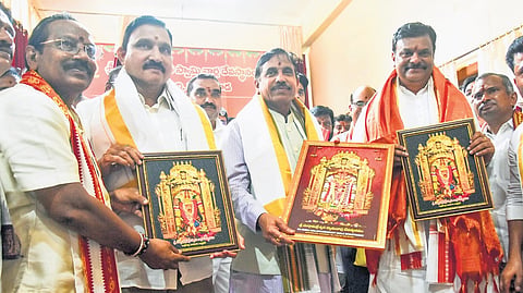 Union Minister for Consumer Affairs Prahlad Joshi (middle), along with AP BJP chief PVN Madhav and Vijayawada West MLA YS Chowdary, after offering prayers at the Durga temple in Vijayawada on Tuesday.