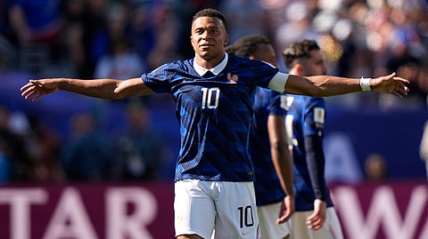 France's Kylian Mbappe celebrates after scoring his side's third goal during the World Cup Group I soccer match between France and Senegal in East Rutherford, N.J., near New York, Tuesday, June 16, 2026.